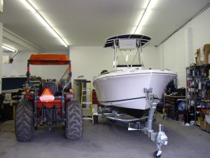 Work station with boat next to a tractor